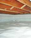 a moisture barrier installed on the walls and floors of a crawl space in Fort-Coulonge