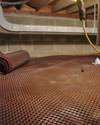 Crawl space drainage matting installed in a home in Duclose
