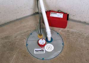 A sump pump system with a battery backup system installed in Venosta